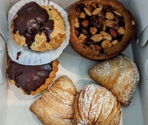 Chocolate bombolone, Mixed nuts apricot tart, Sfogliatella.