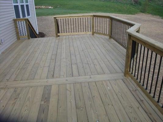 Treated Deck with Deckorator black aluminum balusters built in Green, Ohio.