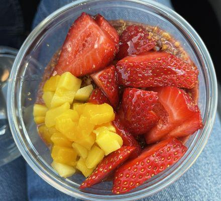 Açaí bowl (açaí and granola is under the fruit)