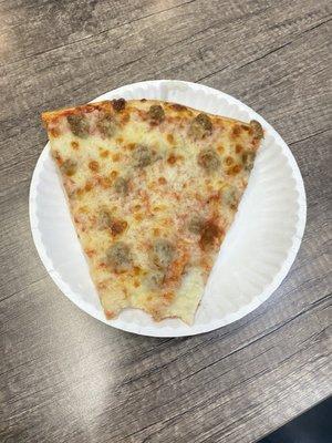 Sausage pizza slice