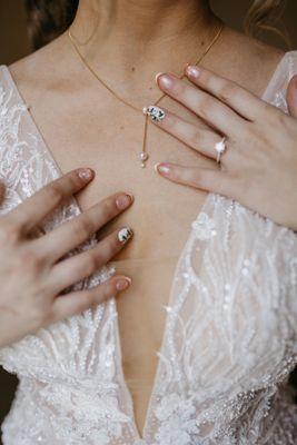 Details photo of my nails and necklace