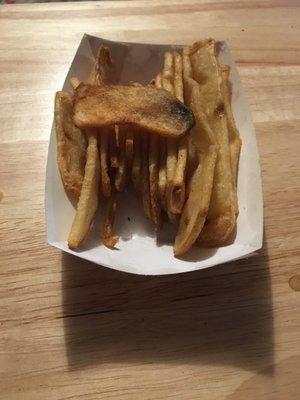 Small order of small, burnt, flat fries