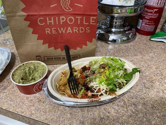 Burrito bowl with brown rice, super salty black beans, salty peppers and salty double steak, flavorless pico and brown guacamole.