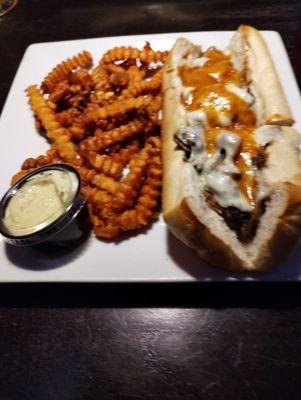 66 Beef brisket sub with sweet potato fries, yummy!