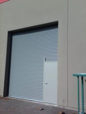 Rolling Steel service door with a pass door