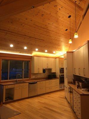 Led cove lighting, recess cans and pendant lights.