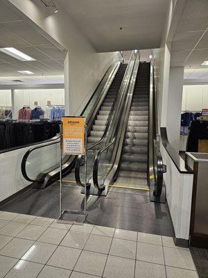 Restrooms are upstairs... use the escalator