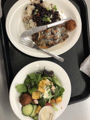 blackened salmon (comes with rice and beans, a hushpuppy, and a salad. salad has lettuce, croutons, parmesan, tomatoes, and raisins?)