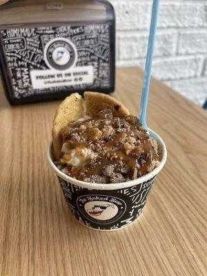 Almond cookie with almond ice cream topped with heath bits