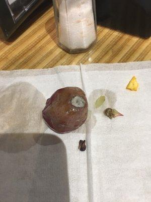 A grape that was about to be eaten and it has mold on it told the server and all she said was oh I sorry.