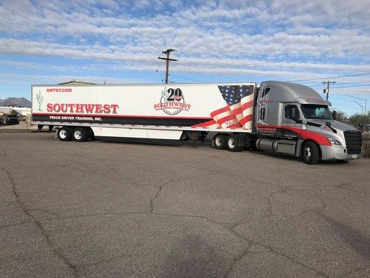 Good looking training tractor and trailer! We only train on the best equipment.