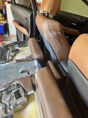 The back of the driver seat was covered with paint. I removed what I could - Nelson's made it look brand new.