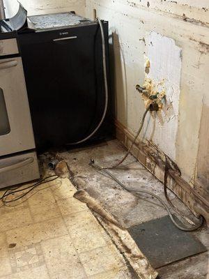 The kitchen was destroyed. A pipe burst in the building.