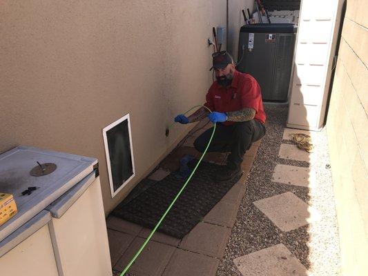 Sewer cleaning with a high-pressure water jet