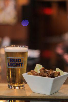 Budlight and Pork belly appetizer.