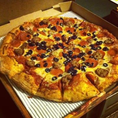 Extra large pizza with pepperoni, sausage & black olives.