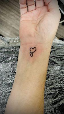 Infiniti heart 1"x1" inner wrist tiny tattoo