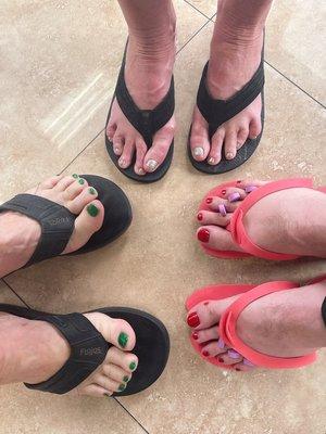 Dad, mom and son getting their pedicures done on Christmas' eve