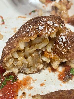 Fried ossobuco rice ball appetizer.