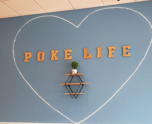 Minimalist decor inside Poke Bros. The space is clean and well-lit, still fairly new!