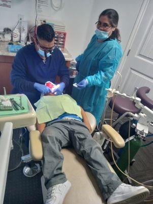 Second treatment procedure doing a baby root canal on my son