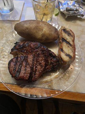 12oz filet, baked potato and bread.