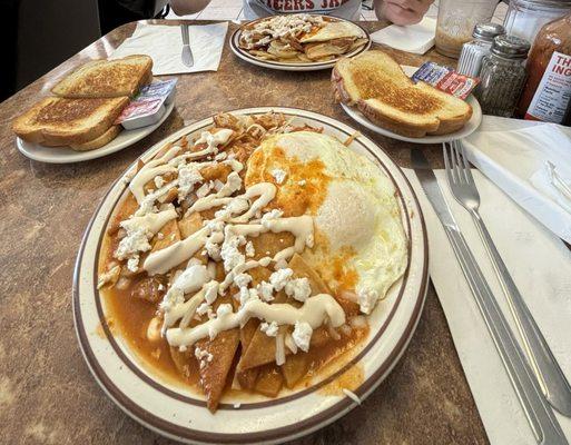 Chilaquiles with Hash browns, eggs, 4 slices of sourdough bread