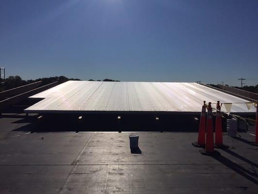 Corrugated metal roof & rubber roof.