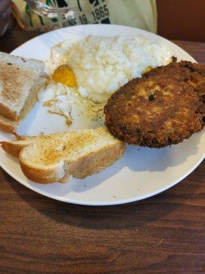 Salmon croquettes with Sunnyside up eggs