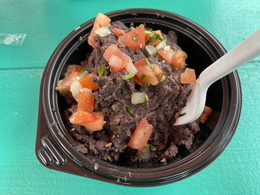 Black beans with green chiles. Like the best refried beans you've ever had, just with black beans instead.