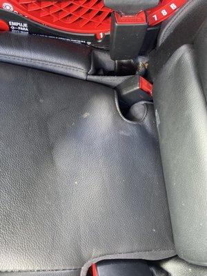 Dirty back seat after "90$ detailing "