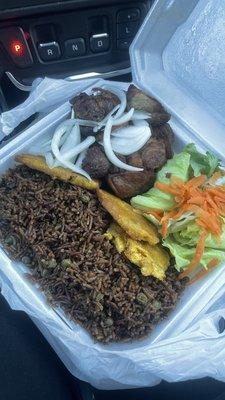 Griot with Djondjon. Better than some places I've had in Miami! So good and plentiful!