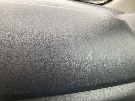 Cut marks on the dash above glovebox