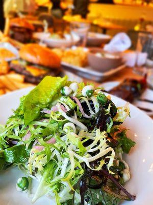 Mixed greens with wasabi peas!