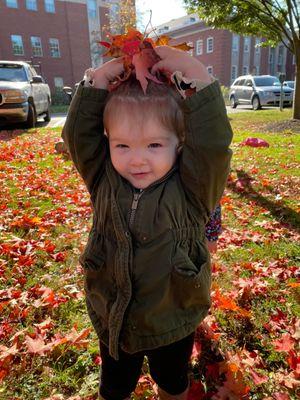 Playing in the leaves at Diamond Park.