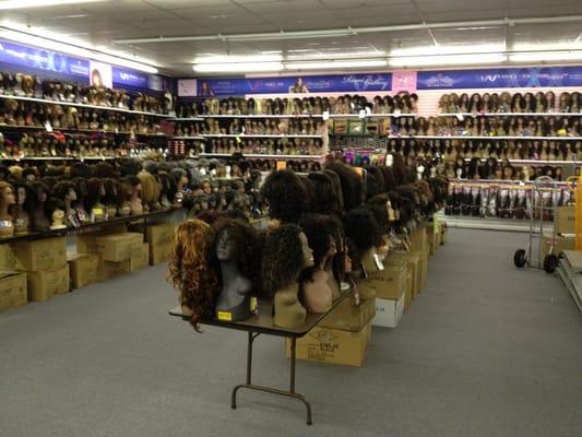 Smaller of the two wall of wigs