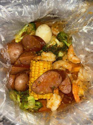 Shrimp bag with added sausage and the sweet Cajun sauce