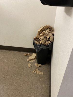 Garbage in womens bathroom