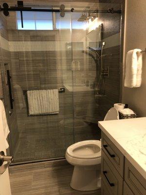 Final shower remodel with new doors installed.