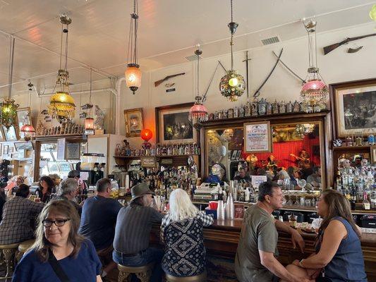 The Bar, under the red latern are old pickle jars.