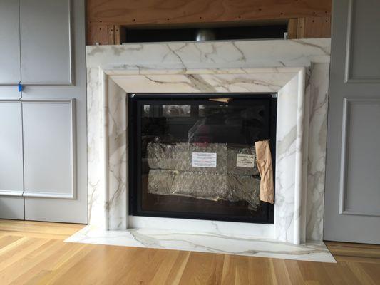 Custom edge fireplace  Calacatta Oro; Piedmont CA