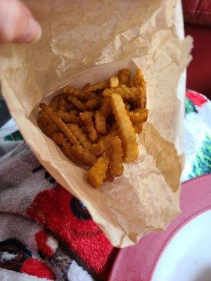 Overcooked, mushy fries, full of oil.