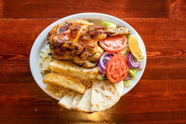 Greek Style Half Chicken Dinner will leave your mouth drooling. Stop by, Pick up, or Deliver in Chicago.