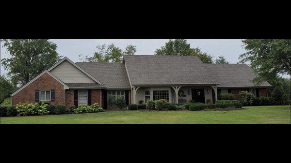 Soft wash roof cleaning after