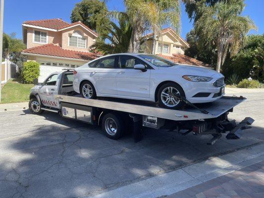 Carlos is a great example of the guys at Carlson Towing. If Bob Carlson reads this, give Carlos a raise for his attitude!