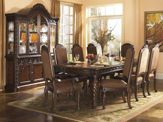 North Shore dining room extension table is masterful enough for a king's table, minus the king's ransom to own. Decorative Old World touches