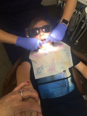 My son looking cool while getting his teeth cleaned at the ONLY dentist office I trust!