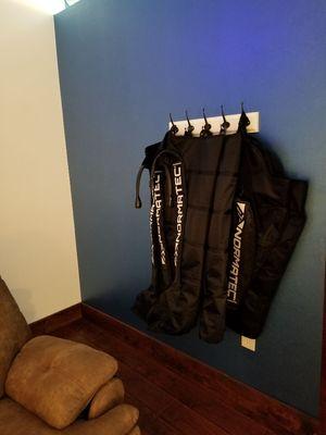 Normatec compression recovery. For arms, legs, or hips. Choose to relax in your own room or out by the tv.