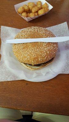 Big C bacon cheeseburger. Plastic knife is for scale.