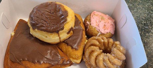 Triangles, Boston Cream, Strawberry Shortcake and  French Cruller